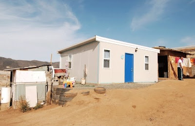 Arial Home casa de bajo costo levantada por voluntarios