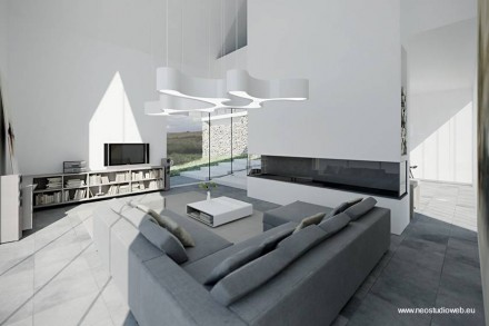 Una vista en perspectiva desde el interior hacia la gran abertura del extremo de la casa Living - Sala de estar de la casa tipo granero en Polonia