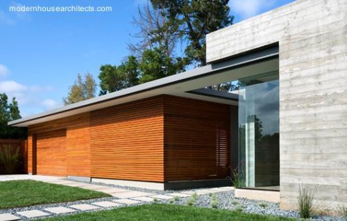 Perspectiva del frente de casa contemporánea una planta